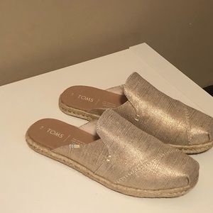 Toms slip ons in a sparkle khaki color way